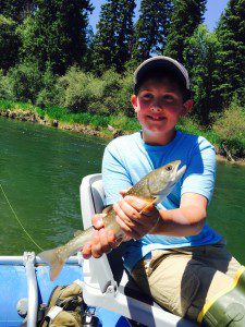 Boy on Fishing Trip - Swan Mountain Outfitters
